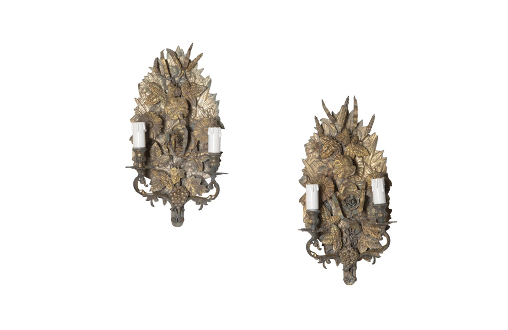Pretty pair of French tole and pressed brass two branched wall lights decorated with flowers, ivy, grapes and wheat.