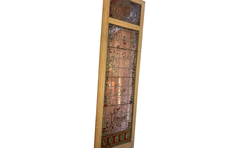 beautiful pair of 19th century stained glass panel doors.