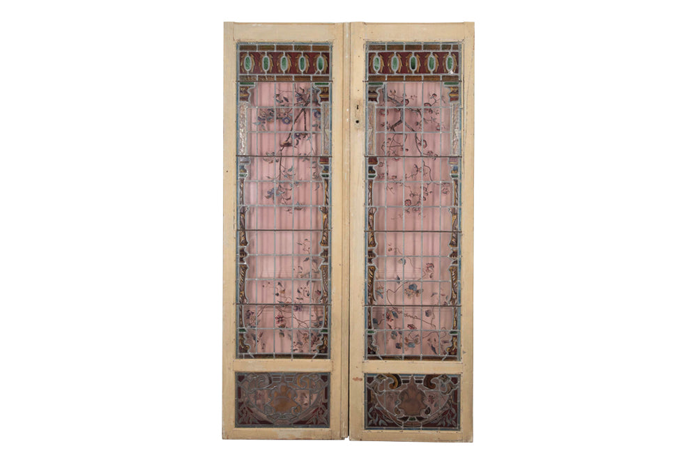 beautiful pair of 19th century stained glass panel doors.