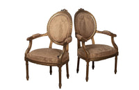 Pair of 19th century, French giltwood armchairs in the Louis XVI style