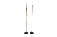 Pair of elegant iron floor lamps in the form of stylised reeds and the stem and square base in black and the leaves gilded.