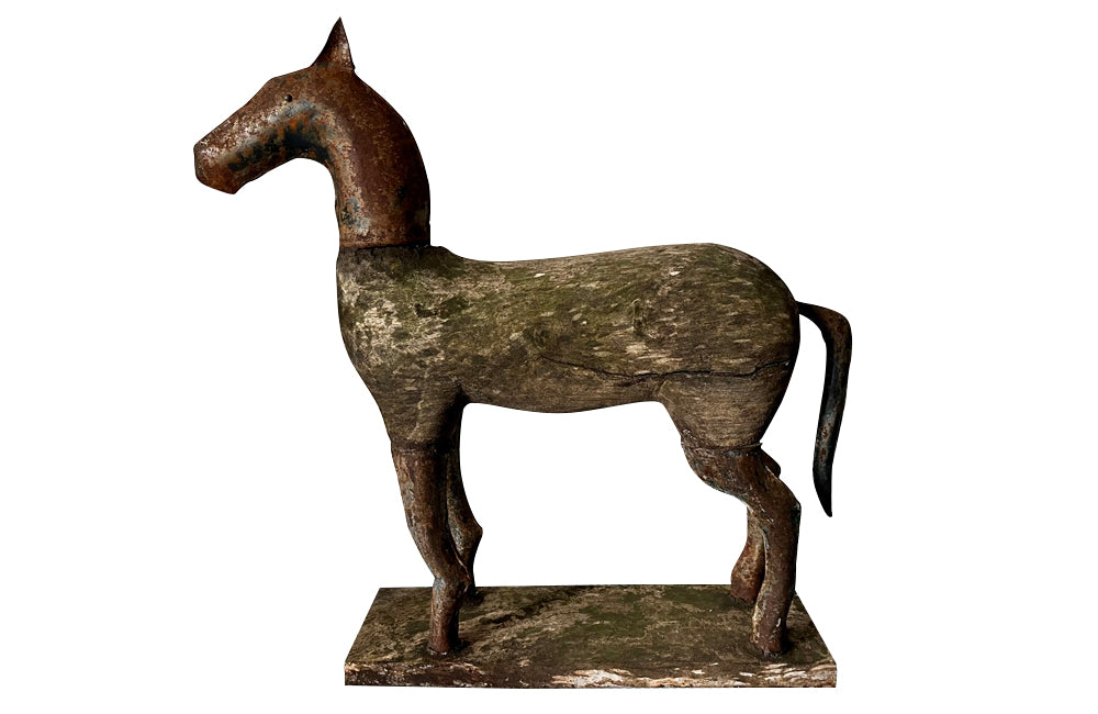 Charming, primitive wooden and iron horse