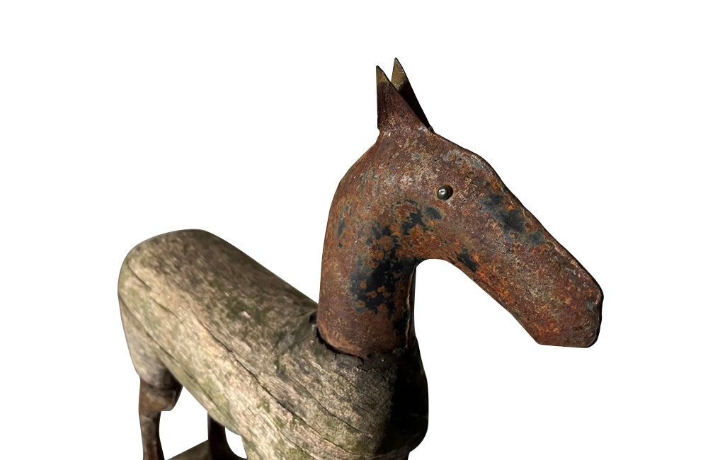 Charming, primitive wooden and iron horse