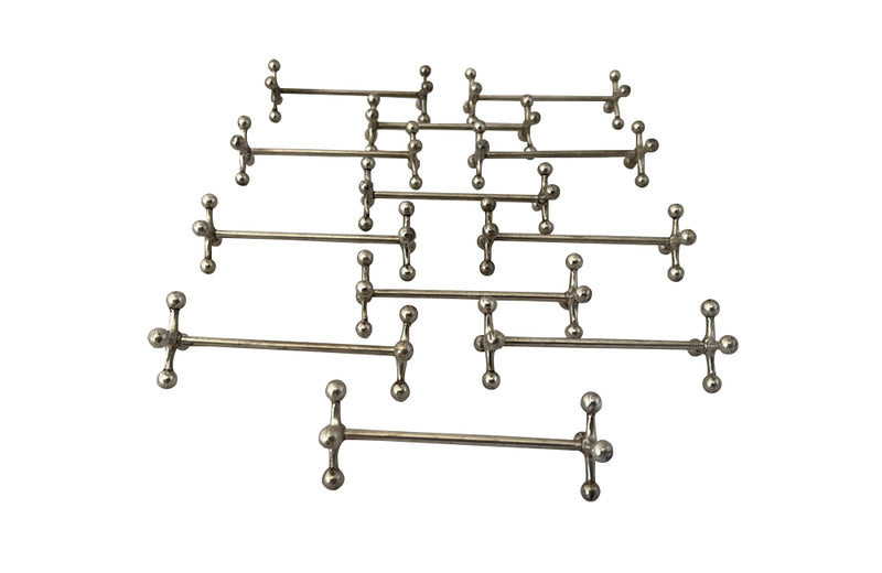 Stylish set of twelve art deco silverplate cutlery rests of simple and elegant design. 