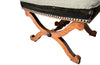 Oak x frame stool in the Neo-Classical style with spindle stretcher its charming tapestry depicting a Caribbean female figure. 19th century