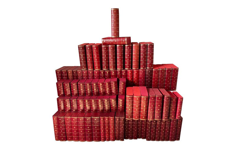 COLLECTION OF 85 RED LEATHER FAUX BOOK FILES