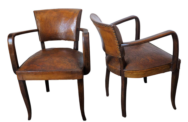 FOUR LEATHER BRIDGE CHAIRS