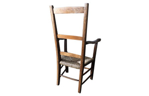 ART-POPULAIRE CARVED SERPENT ARMCHAIR