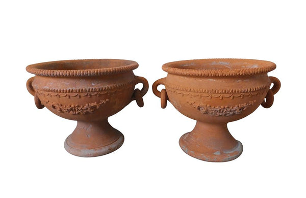PAIR OF DECORATIVE TERRACOTTA PLANTERS