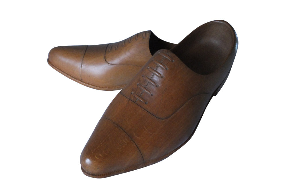 BEAUTIFUL PAIR OF FINELY CARVED TREEN SHOES