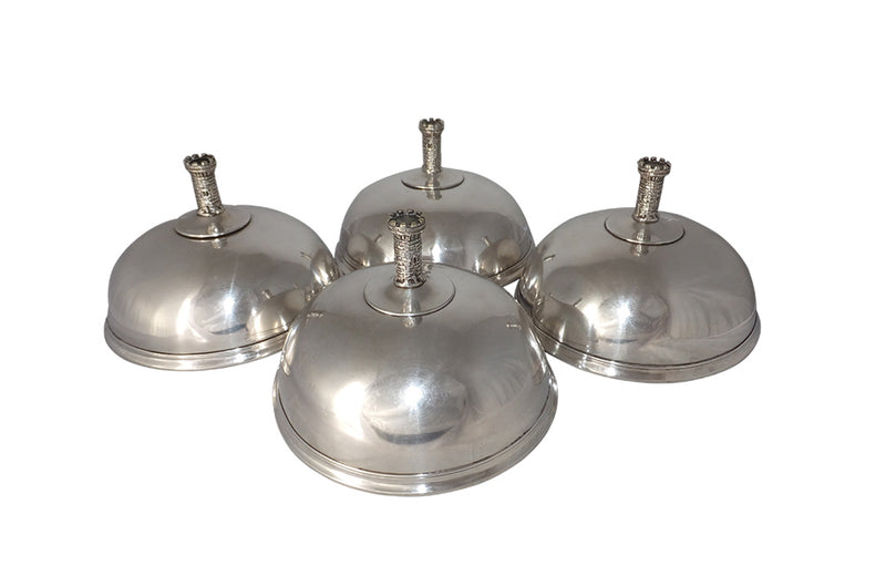 SET OF FOUR SILVER PLATE FOOD DOMES
