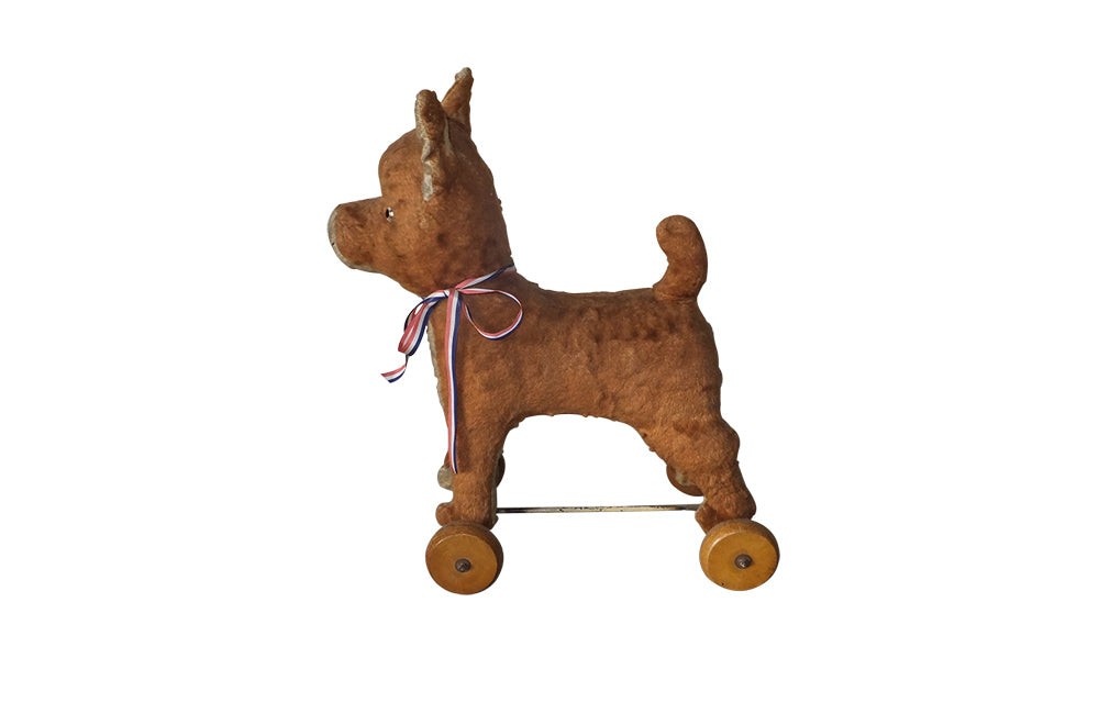 FRENCH ANTIQUE TOY DOG ON WHEELS
