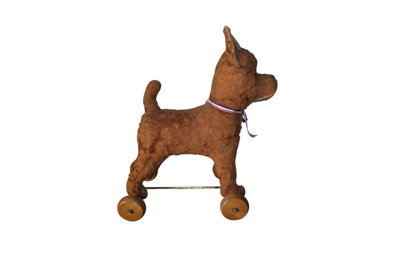 FRENCH ANTIQUE TOY DOG ON WHEELS
