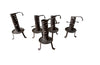 COLLECTION OF FIVE FRENCH IRON CELLAR CANDLESTICKS