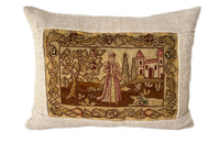 Charming cushion made with a 19th Century tapestry depicting a lady in the garden of a chateau with a duck.  It is feather filled and backed with lovely antique hemp fabric