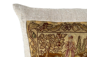 Charming cushion made with a 19th Century tapestry depicting a lady in the garden of a chateau with a duck.  It is feather filled and backed with lovely antique hemp fabric