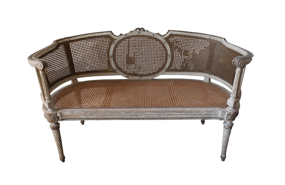 Louis XVI Revival Caned Banquette - Caned Canape - Cane and Linen Sofa - Neoclassical Revival -French Antiques - Antique Seating - Painted Antique Seating – Decorative Antique Furniture – French Antique Furniture - AD & PS Antiques