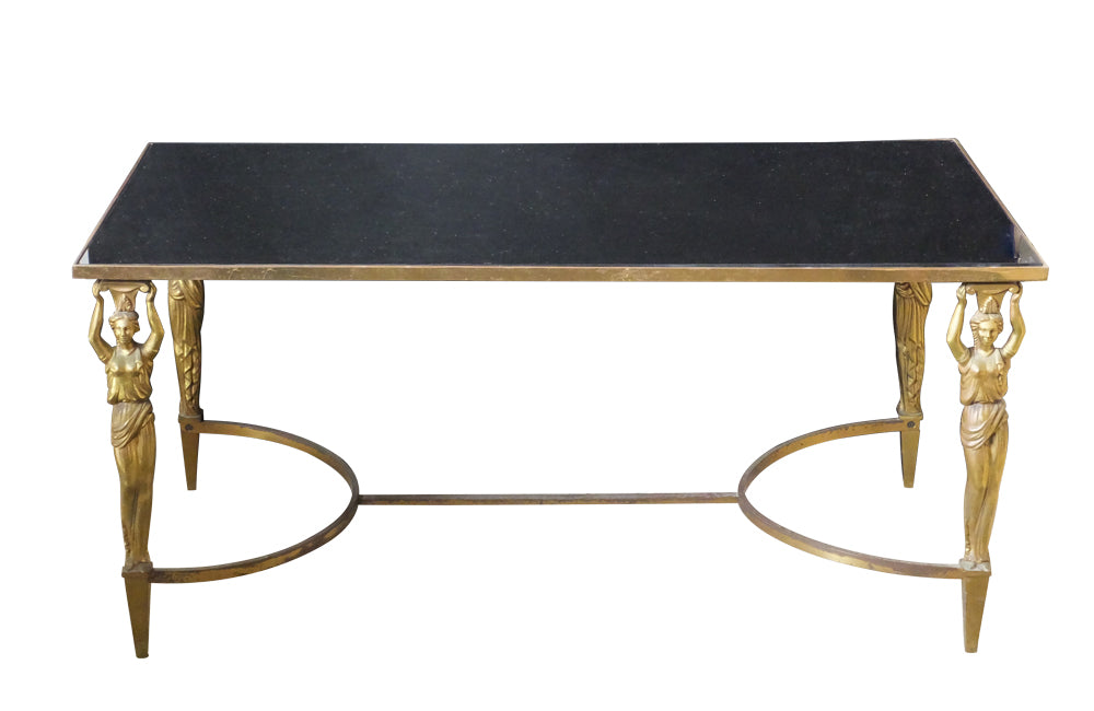 Mid Century French Coffee Table in the Neo-Classical style with brass female caryatids supporting a brass framed black glass top - French Mid Century Furniture - AD & PS Antiques 